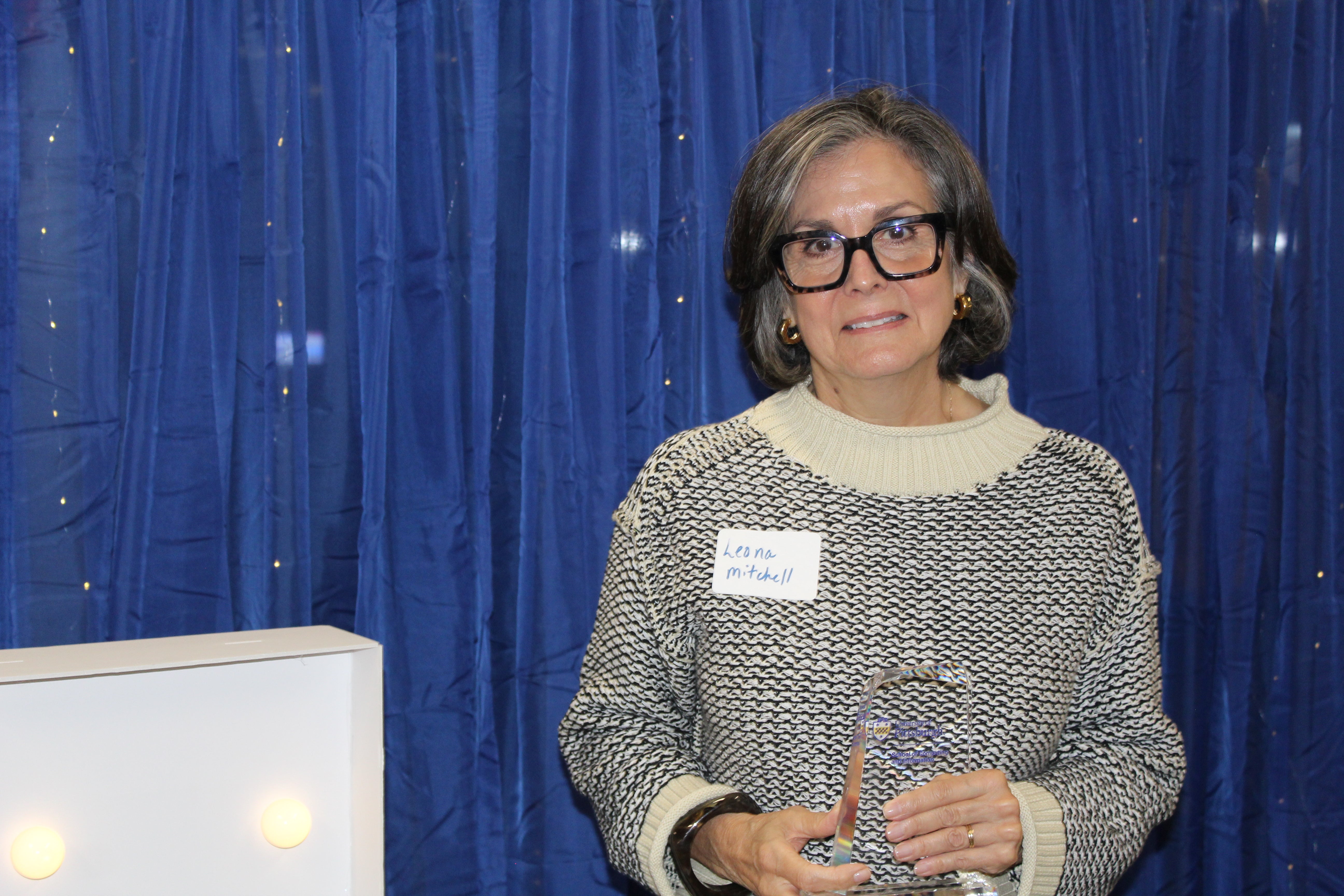 Leona Mitchell holding her Lifetime Achievement Award.