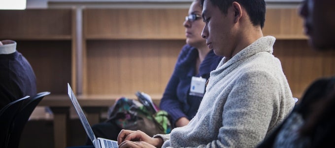 Man typing on laptop