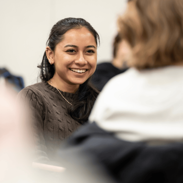 A female student smiling.