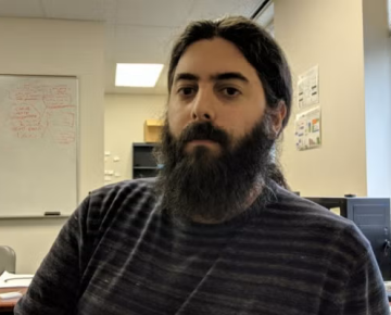 A man sitting at a desk