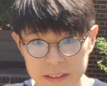 man wearing glasses outside