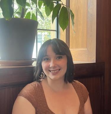 Headshot of MLIS student Scylla Humbert