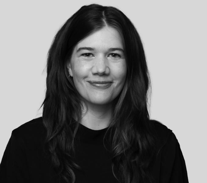 black and white photo of woman with long hair